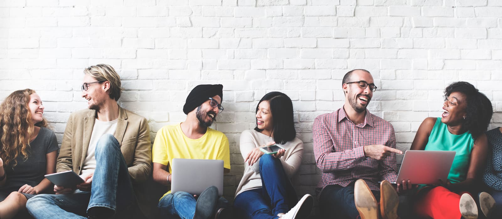 diverse group of people happy and laughing