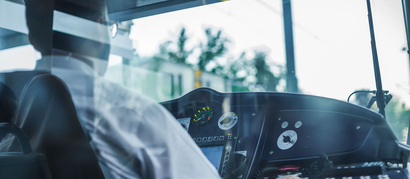 Train Driver Medical - image of a train driver in cab