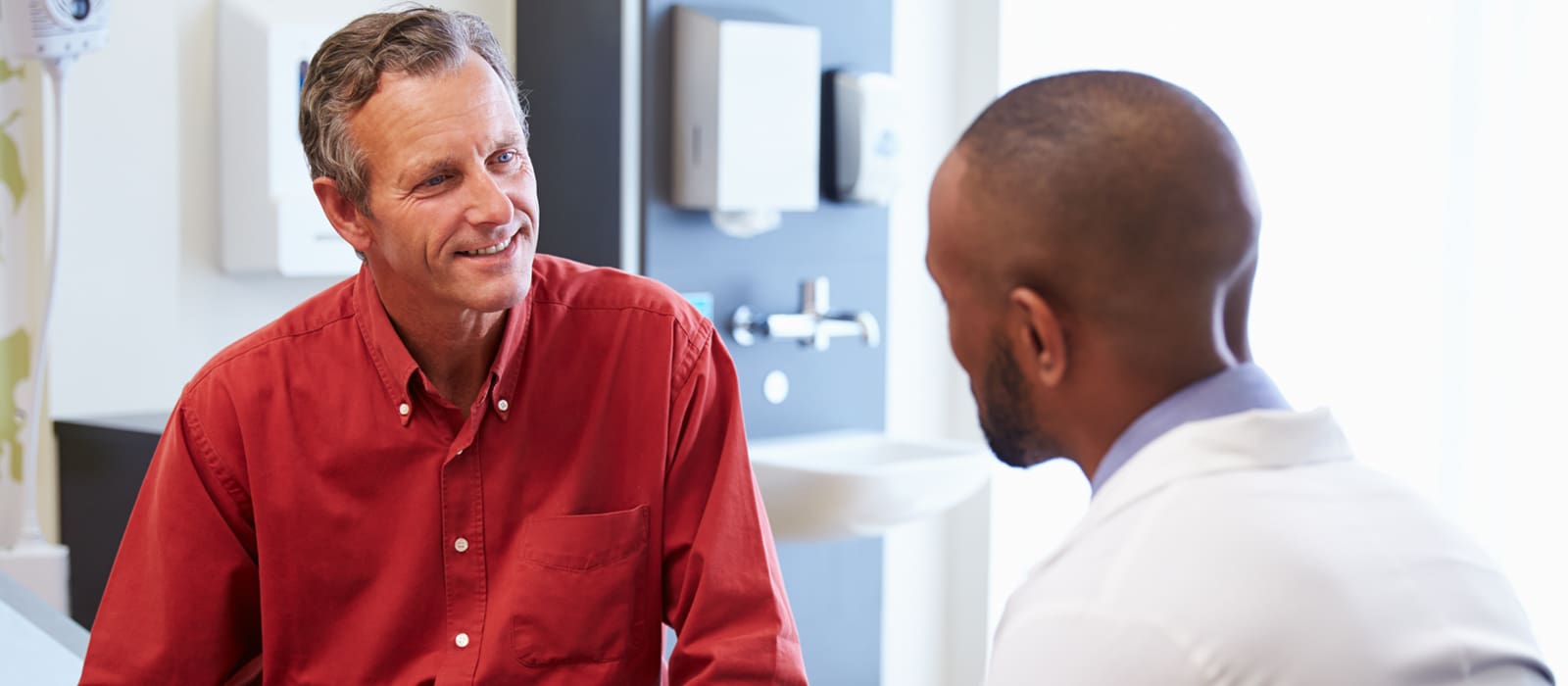 Spirometry testing and Management referral services - consultant talking to patient